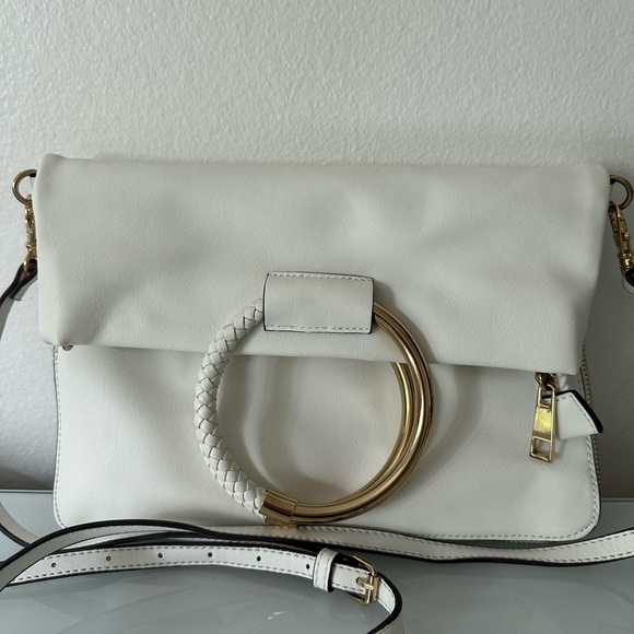 Handbags - Aldo handbag, shoulder bag, clutch, or crossbody bag white with gold-tone rings.